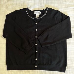 Vintage but like new little black cardigan with pearl buttons. Size 12